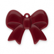 Statement hangers bow Rust red