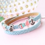 Schattige armbandjes, afgemaakt met bedels, onderdelen en schuivers van DQ metaal