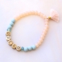 Armbandjes gepersonaliseerd met letterkralen van DQ metaal