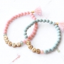 Armbandjes gepersonaliseerd met letterkralen van DQ metaal