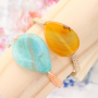 Sieraden met half edelsteen kralen in warme kleuren