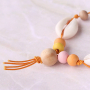 Sieraden met een strandthema van houten kralen, DQ metaal en schelpen