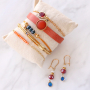 DIY sieraden met oranje, rode, witte en blauwe details voor Koningsdag