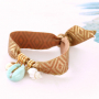 Deze armbandjes met elastisch lint maak je in minder dan twee minuten!