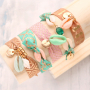 Deze armbandjes met elastisch lint maak je in minder dan twee minuten!