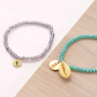 Snelle facetarmbandjes met bedeltjes en kwastjes