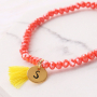 Snelle facetarmbandjes met bedeltjes en kwastjes