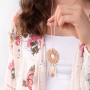 DIY sieraden voor het festival seizoen met veertjes en rotan hangers