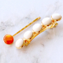 Hoe maak je trendy haaraccessoires en sieraden met kauri schelp kralen?