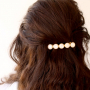 Hoe maak je trendy haaraccessoires en sieraden met kauri schelp kralen?
