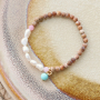Lees hier hoe je armbanden en oorbellen maakt met natuursteen kralen
