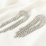 DIY: sprankelende oorbellen en armbanden van strass chain