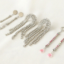 DIY: sprankelende oorbellen en armbanden van strass chain
