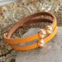Leren armbanden en sleutelhangers van schitterend DQ leer voor de feestdagen