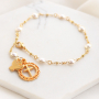 Super trendy sieraden met religieuze symbolen