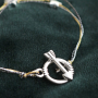 Armbanden en oorbellen maken met kralen van hematite