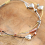Armbanden en oorbellen maken met kralen van hematite