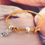 Armbanden maken met DQ trendy geweven koord doe je zo: