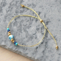 Zie hier hoe je met de evil eye kralen trendy armbandjes maakt: