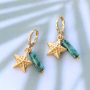 Subtiel & stijlvol, zo gebruik je de DQ metalen collectie in je sieraden: