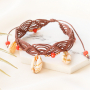 DIY: sieraden maken met kauri schelpjes
