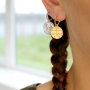 Deze sieraden kun je eenvoudig zelf maken met de populaire horoscoop bedels: