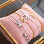 Deze sieraden maak je met de nieuwste stainless steel jaartal tussenstukken:
