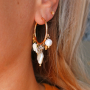 Met zoetwaterparels kun je deze haaraccessoires en oorbellen maken: