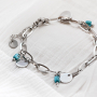 Get inspired! Cre&euml;er een trendy look met schakelkettingen en armbanden: 