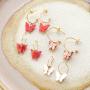 Deze sieraden kun je maken met de stainless steel resin vlinder bedels 