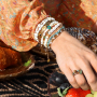 Armbanden en kettingen maken met zoetwaterparels, schelp kralen, rocailles, bloem bedels en natuursteen kralen: