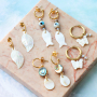 Bekijk hier hoe je zomerse sieraden maakt met schelp bedels