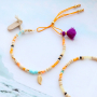 Kleurrijke armbanden maken met 1,5 cm kwastjes, macram&eacute; draad en diverse kralen!