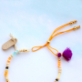 Kleurrijke armbanden maken met 1,5 cm kwastjes, macram&eacute; draad en diverse kralen!