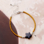 Maak minimalistische armbanden met deze kleine rocailles 