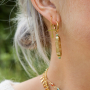 Get inspired: draag betekenisvolle sieraden bij de trend die we deze herfst en winter veel gaan zien: spirited comfort.