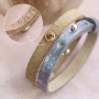 Maak een trendy armbanden collectie met Cuoio schuivers en cabochons