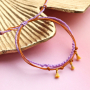Verwerk de mini kwastjes in vrolijke sieraden