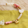 Zo verwerk je letterkralen in je sieraden collectie