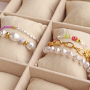 Idee&euml;n voor het cre&euml;ren van sieraden met parels imitatie