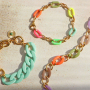 Ontwerp oorbellen, armbanden, kettingen en telefoonkoorden met acryl schakels