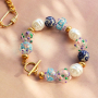 Zo verwerk je handgeschilderde glaskralen in je sieraden