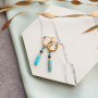 Trendy oorbellen met rvs creolen als basis