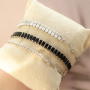 Zo draag je de kant-en-klare armbanden en kettingen samen