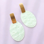 Zo ontwerp je zomerse oorbellen met hangers van resin eigen designs