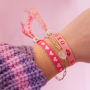 Zo ontwerp je armbanden met tekstlint