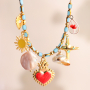 Zomerse sieraden inspiratie met metaal bedels DQ met enamel