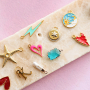 Zomerse sieraden inspiratie met metaal bedels DQ met enamel
