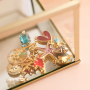 Zomerse sieraden inspiratie met metaal bedels DQ met enamel