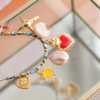Zomerse sieraden inspiratie met metaal bedels DQ met enamel